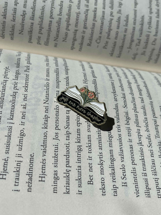 Pins "just one more chapter"